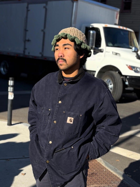 The “Evergreen Edge” ruffle bucket beanie