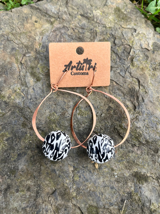 Copper hoop earrings with painted wood bead