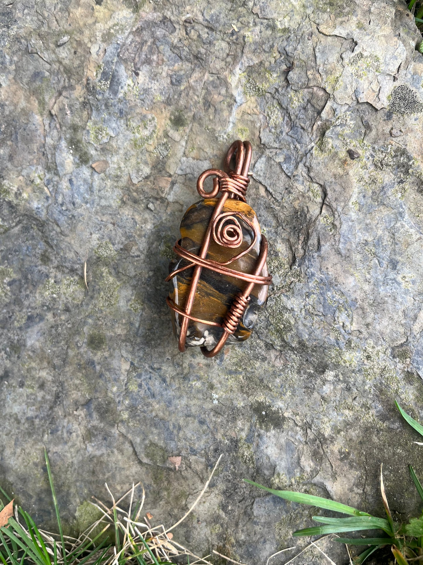 Copper wrapped tigger eye pendant
